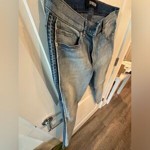 Express skinny jeans, with cute detail on the sides. Size 10R. High rise.